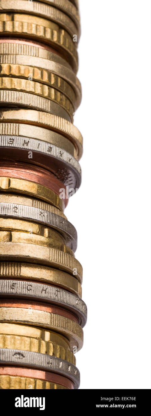 huge tower of different euro coins in close up shot isolated in white background Stock Photo