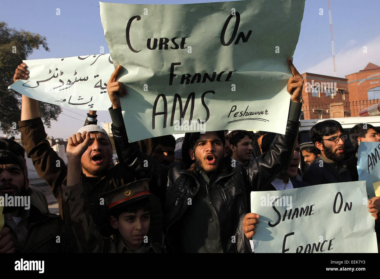 Peshawar. 19th Jan, 2015. Pakistani students shout slogans during a protest against the publication of caricatures of the Prophet Muhammad by French magazine Charlie Hebdo, in northwest Pakistan's Peshawar on Jan. 19, 2015. © Umar Qayyum/Xinhua/Alamy Live News Stock Photo