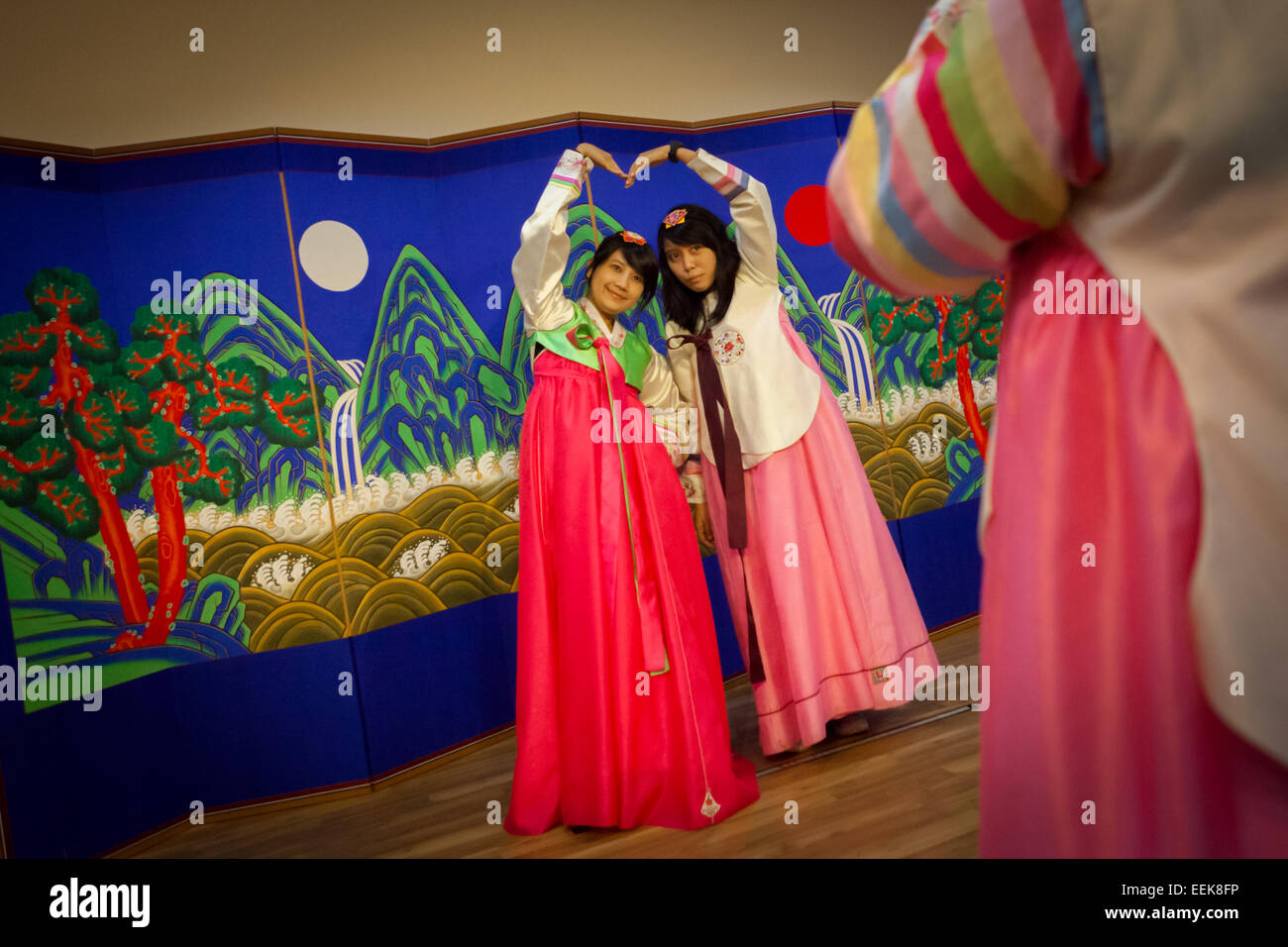 Indonesian students having a photo session as they are wearing 'hanbok', a Korean traditional clothes, at Korean Cultural Center in Jakarta, Indonesia. Stock Photo