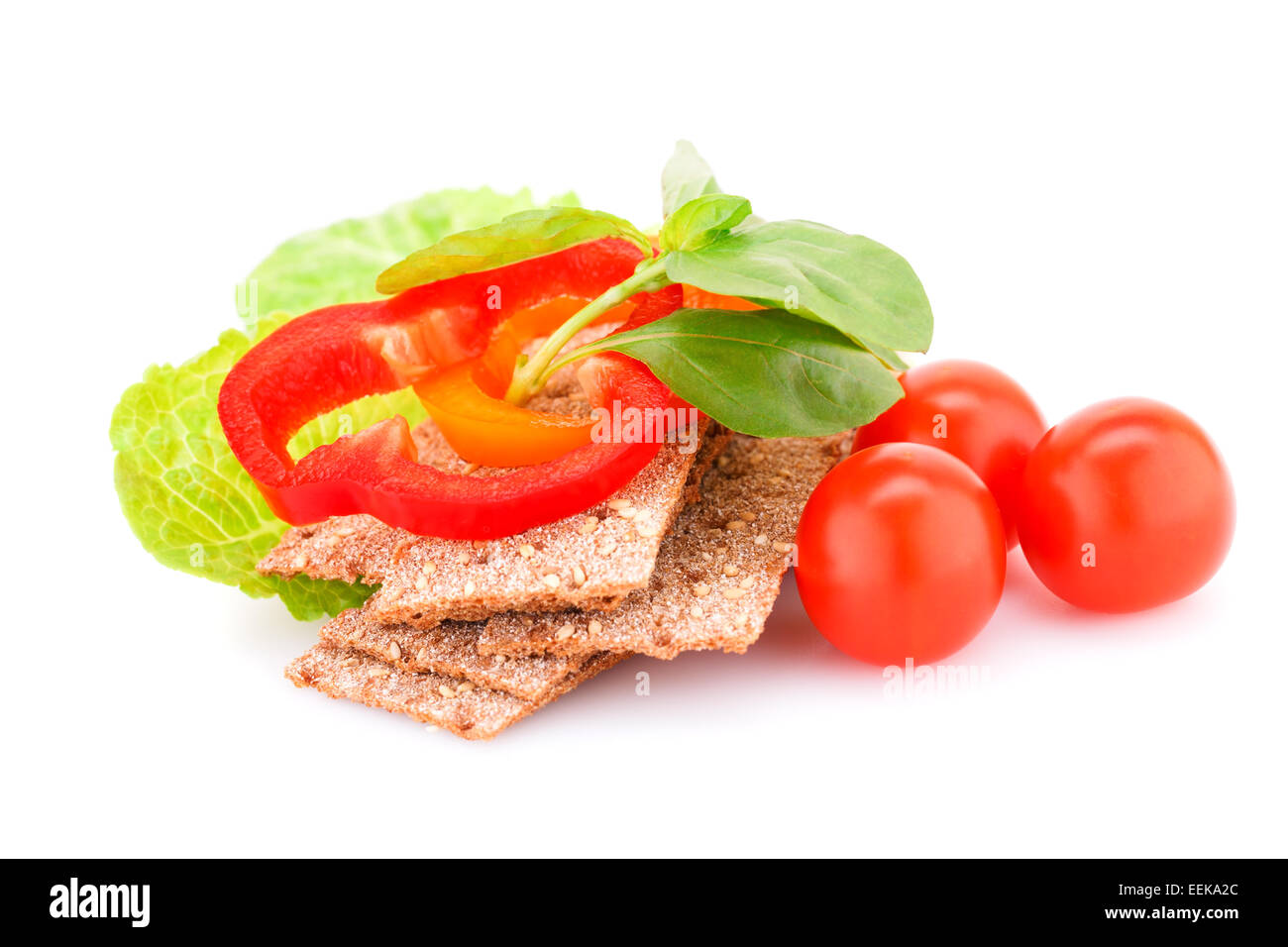 Crackers with fresh vegetables isolated on white background Stock Photo ...