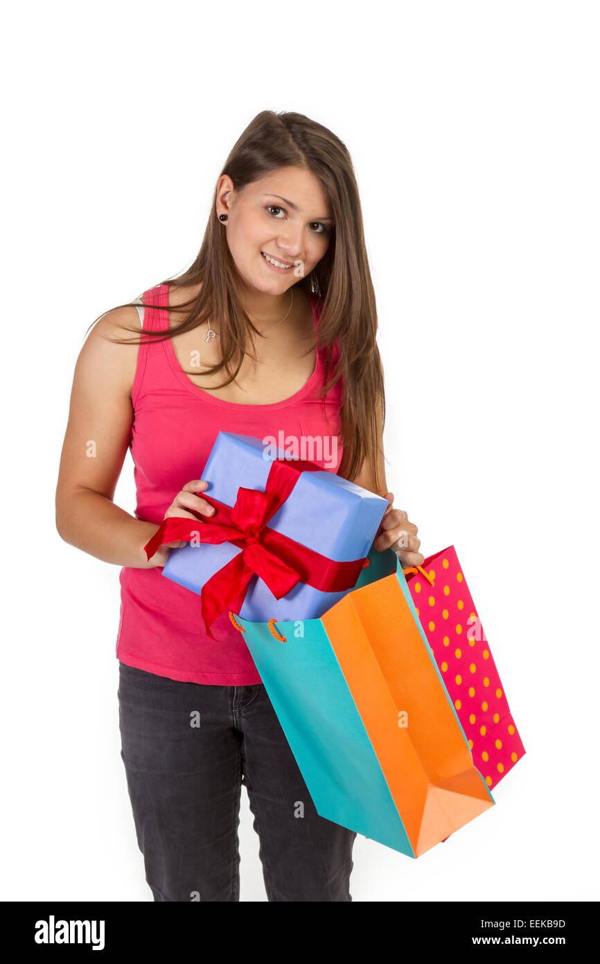 Young dark-haired woman with colorful gift Stock Photo