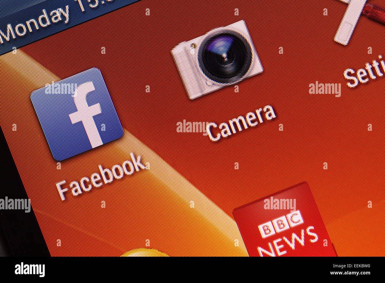 Mobile phone apps for Facebook BBC News and Camera on a smartphone Stock Photo