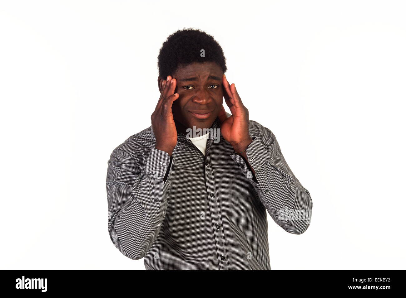 Junger dunkelhäutiger Mann mit Kopfschmerzen Stock Photo