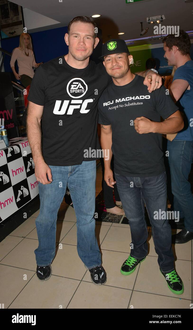 UFC fighters Cub Swanson & Forrest Griffin at a signing for fans at HMV Grafton Street, Dublin, Ireland - 17.07.14.  Featuring: Forrest Griffin,Cub Swanson Where: Dublin, Ireland When: 17 Jul 2014 Stock Photo