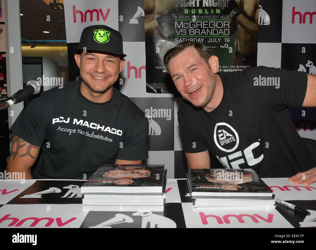 UFC fighters Cub Swanson & Forrest Griffin at a signing for fans at HMV Grafton Street, Dublin, Ireland - 17.07.14.  Featuring: Cub Swanson,Forrest Griffin Where: Dublin, Ireland When: 17 Jul 2014 Stock Photo