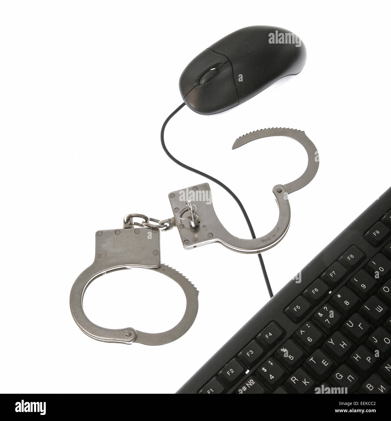 cuffs crime computer law hacker Stock Photo