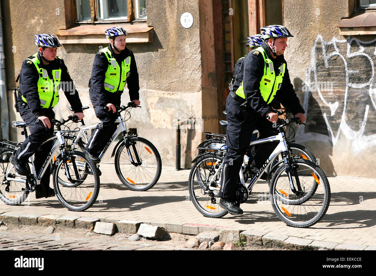 policemen police on bicycles city Stock Photo