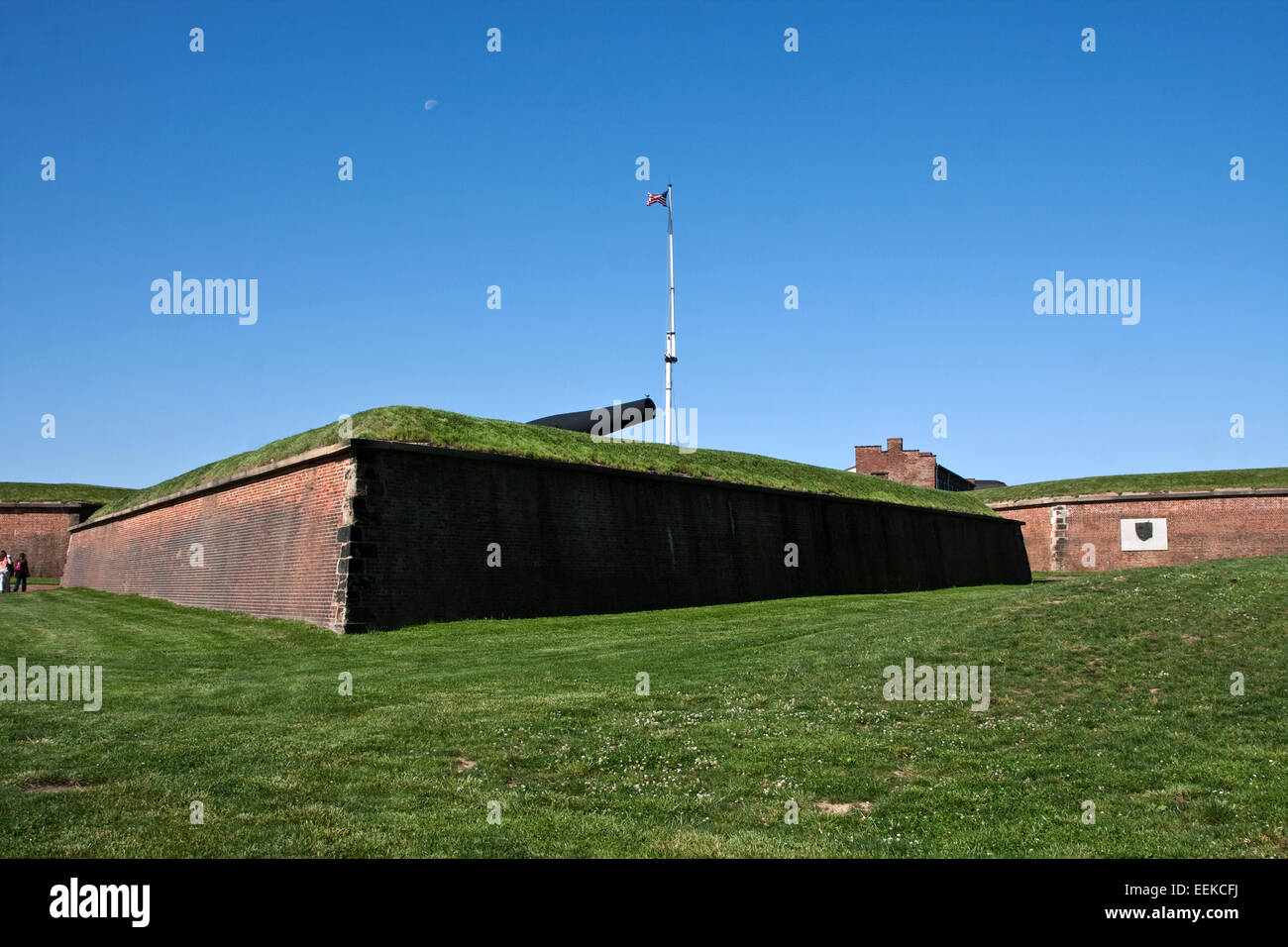 Fort McHenry National Monument and Shrine, Baltimore, Maryland. A lone cannon sticks out over the edge of the fortress walls. Stock Photo