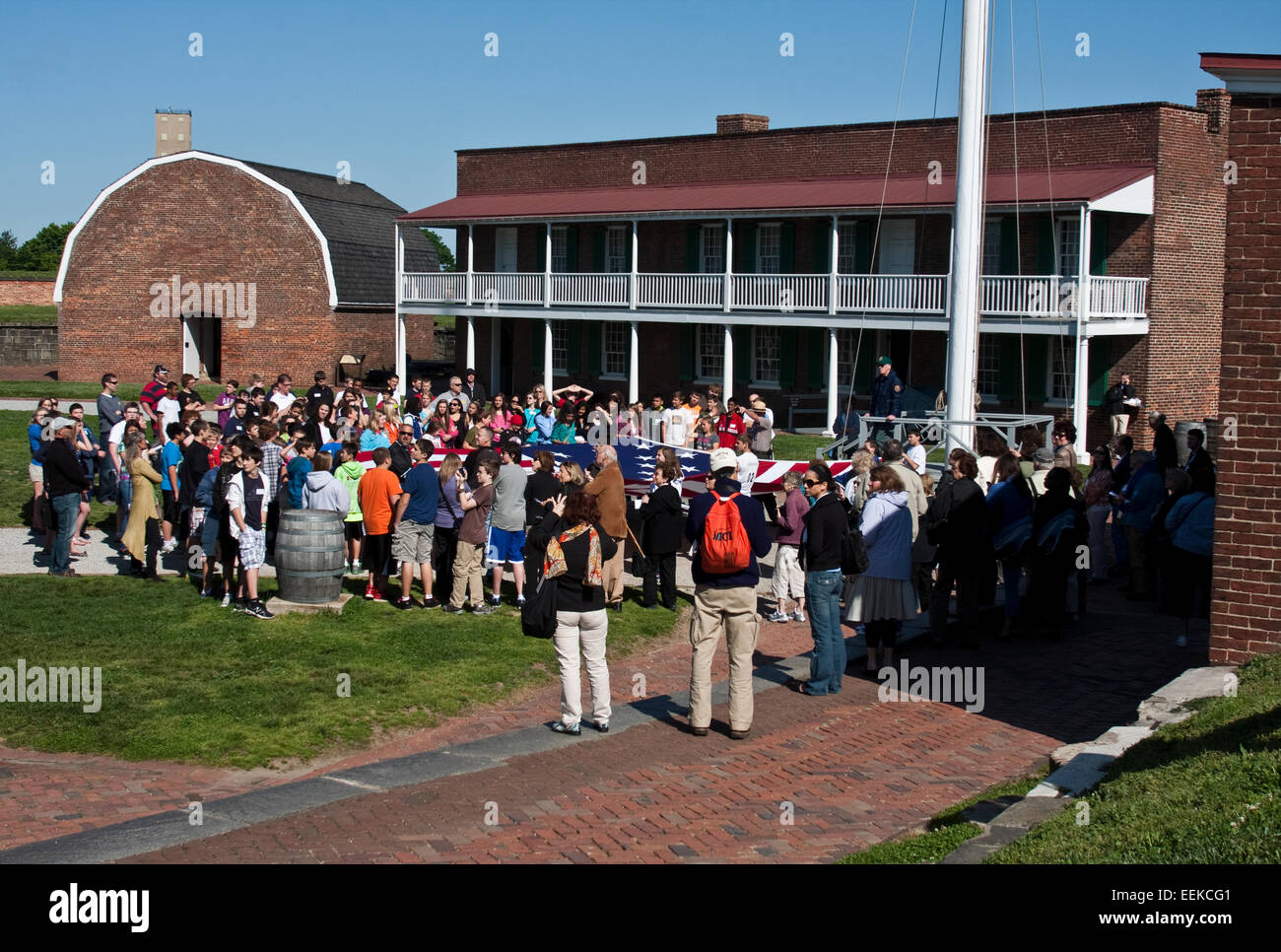 Fort McHenry National Monument and Shrine, Baltimore,  Maryland. Visitors and school children in a flag raising ceremony. Stock Photo