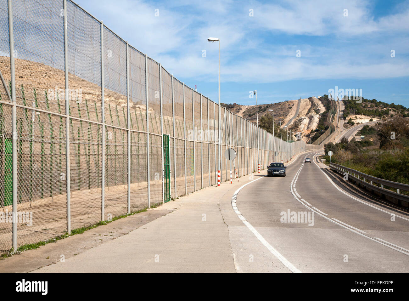 High security fences separate the Spanish exclave of Melilla, Spain from Morocco, north Africa, January 2015 Stock Photo