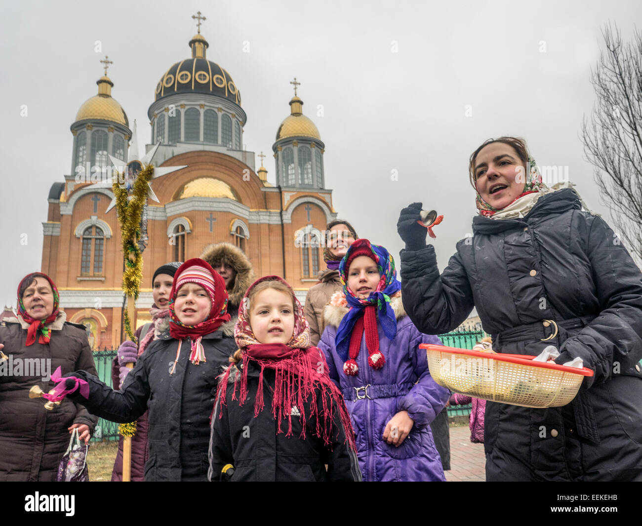 Kiev, Ukraine. 19th January, 2015. great Christian holiday Epiphany. One of the main traditions of celebration is swimming in Jordan (the so-called consecrated priest hole). The current winter was unusually mild in Ukraine and swimming just held on the beach. Ukrainian Church of the Moscow Patriarchate traditionally celebrated in Obolon. Credit:  Igor Golovnov/Alamy Live News Stock Photo