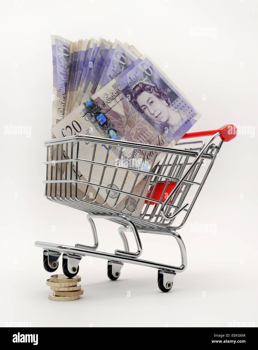 SUPERMARKET TROLLEY WITH £20 NOTES RE SUPERMARKETS FOOD PRICES COSTS HOUSEHOLD BUDGETS PENSION PROVIDER COMPANY SAVINGS CASH UK Stock Photo