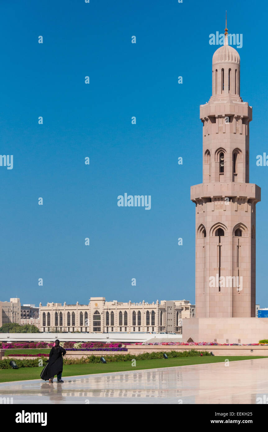 Woman and young girl going to mosque, Muscat, Oman Stock Photo