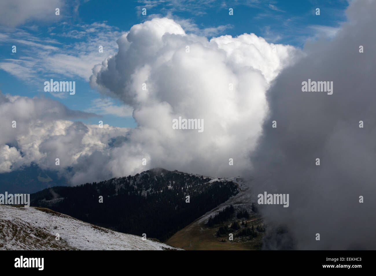 Cloud  mist and snow  on The Schmittenhohe & surrounding mountains  above Zell am See  Salzburgerland Austria Stock Photo
