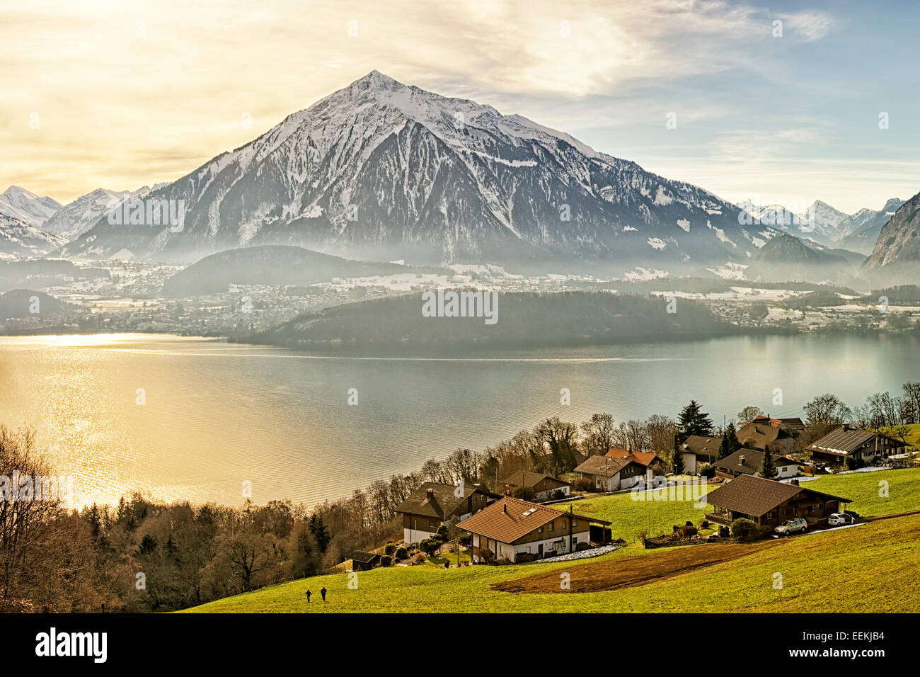 Swiss Rural Swiss rural landscape near Thun lake at winter sunshine in front of ...