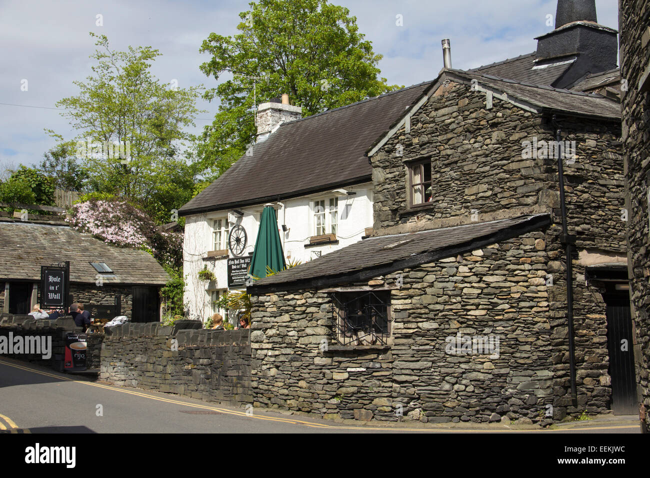 The New Hall Inn, also known as the  'Hole in t' Wall', the oldest pub in Bowness, Cumbria, Dating from 1612. Stock Photo