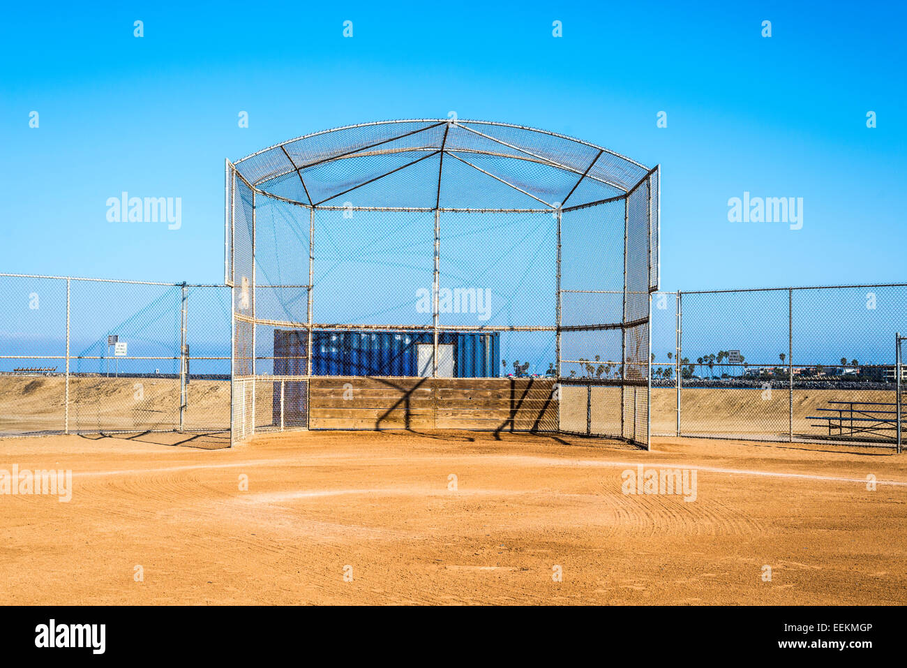 Chain link fence baseball cage and field. Robb Field, San Diego