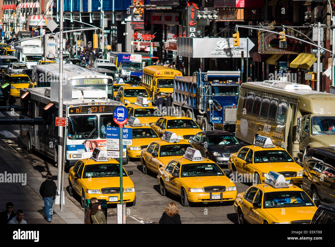 Yellow Taxis And Busy Traffic In Manhattan Stock Photo - Download