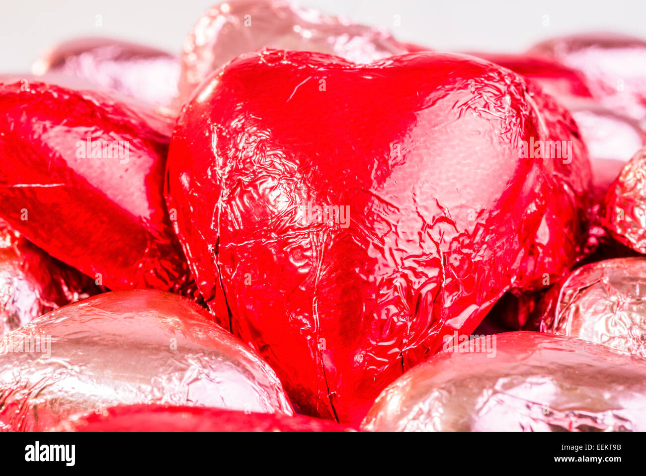 Chocolate Heart with wrapping paper, symbolizing love. Stock Photo