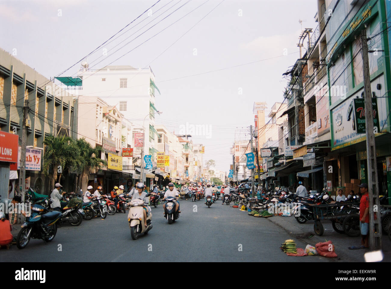 Street scene motorbikes in Vinh Long, Vietnam Stock Photo