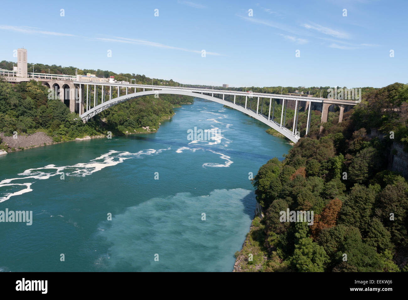 The rainbow bridge connecting the US (right) to Canada (right) at Niagara Falls, New York Stock