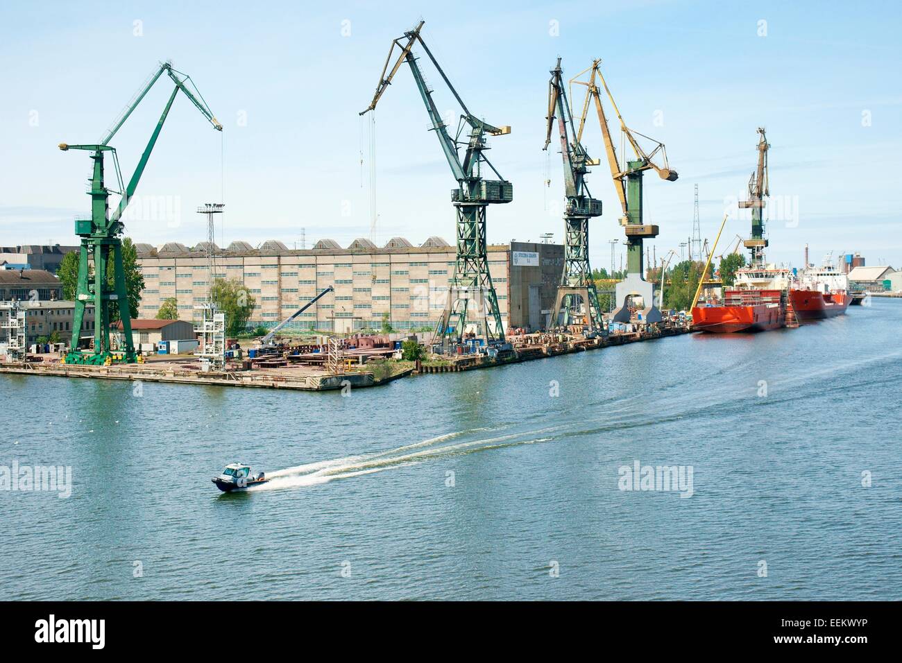 Gdansk Poland. Port dock facilities and warehouses of Stocznia Gdansk S.A. on south tip of Ostrow Island Stock Photo
