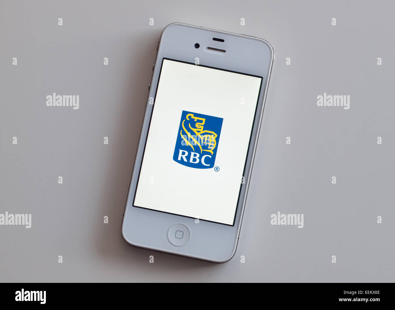 A view of the homescreen from the RBC (Royal Bank of Canada) mobile app on a white Apple iPhone 4. Stock Photo