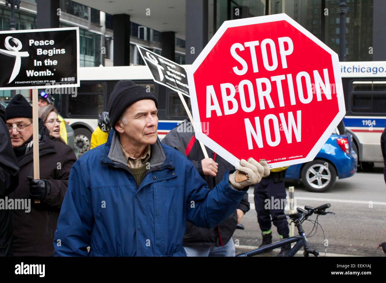 Man holding "Stop Abortion Now" sign. Chicago, Illinois Stock Photo