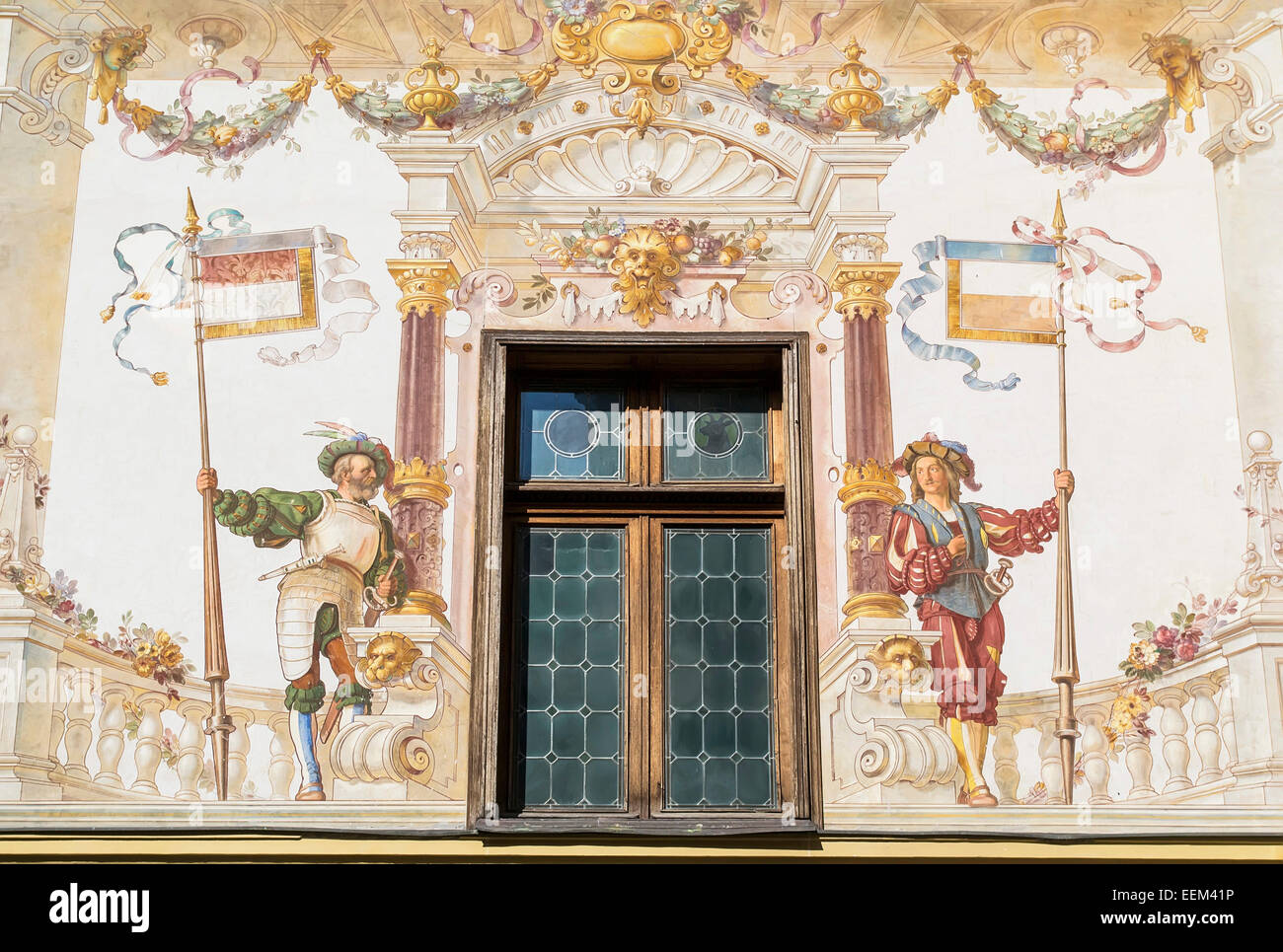 Architectural detail of a medieval fresco framing a window Stock Photo