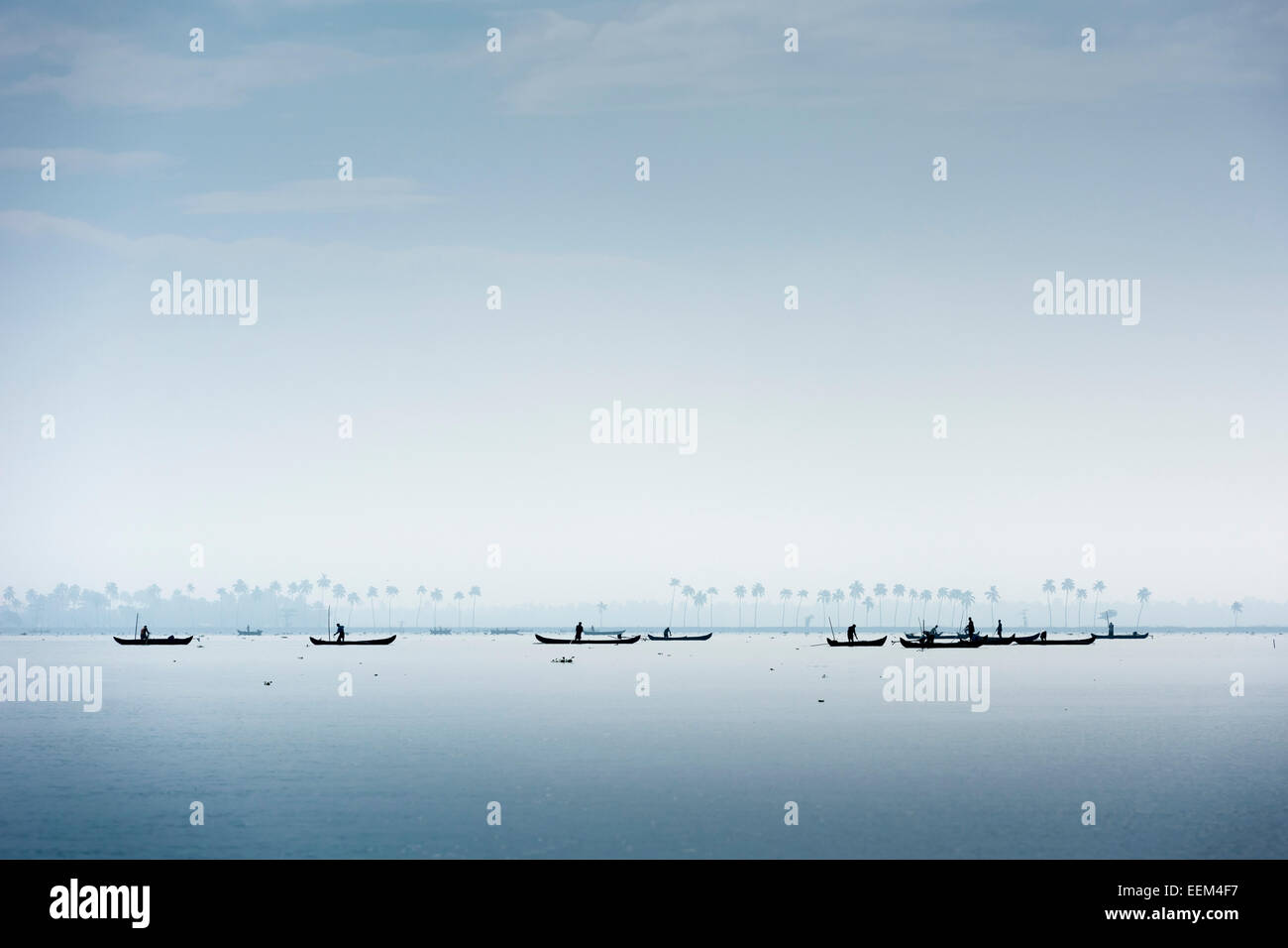 Cockle pickers with their boats, Vembanad Lake, Kerala, India Stock Photo