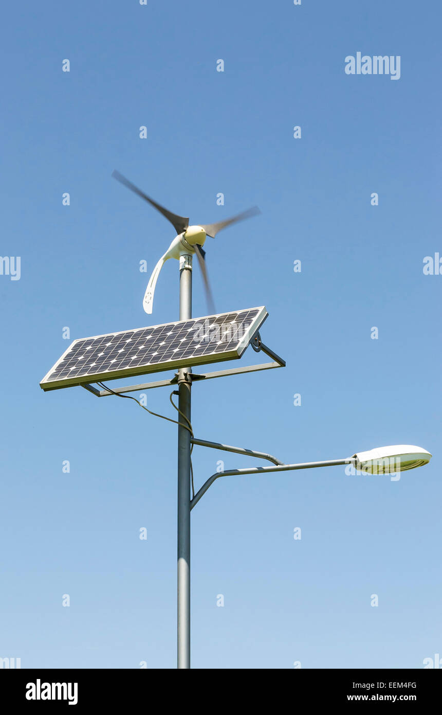 Street lighting integrated solution using solar panel and wind turbine as alternative energy power source Stock Photo