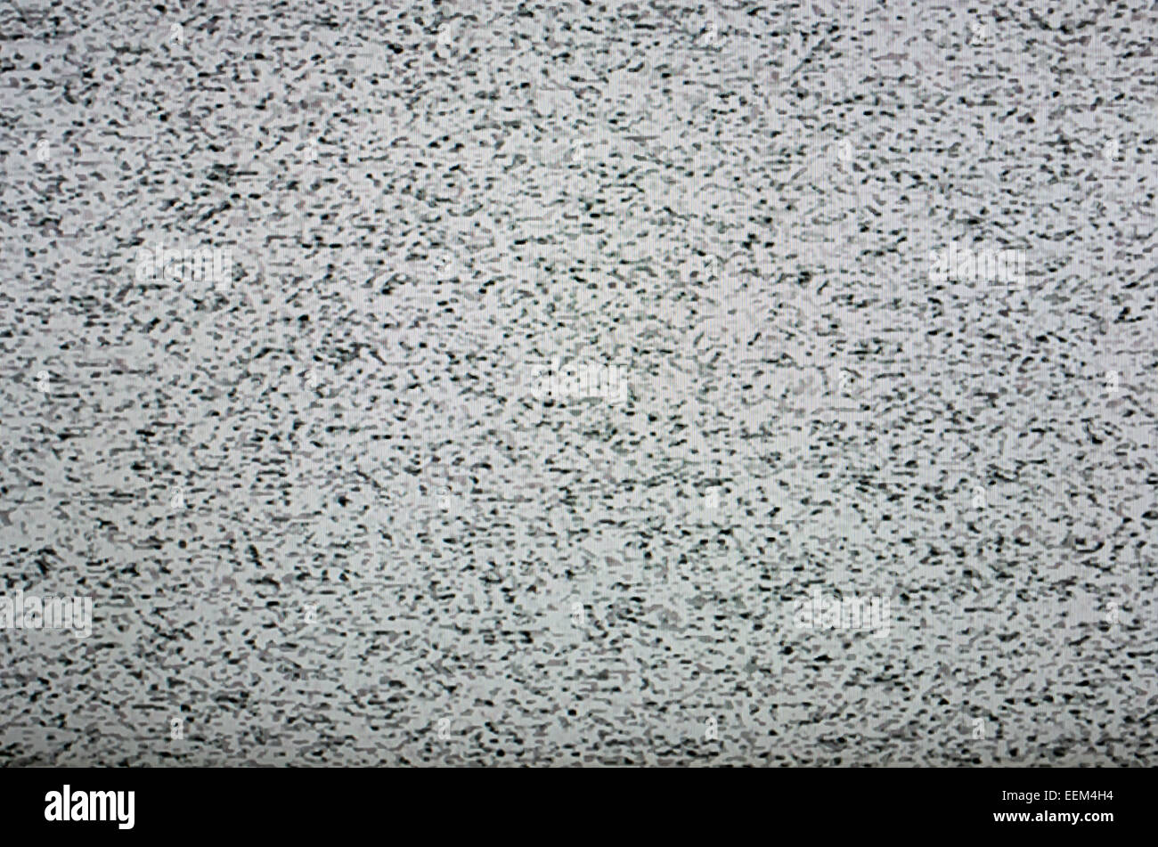 Television static due to lack of transmission signal on digital liquid crystals display, background Stock Photo
