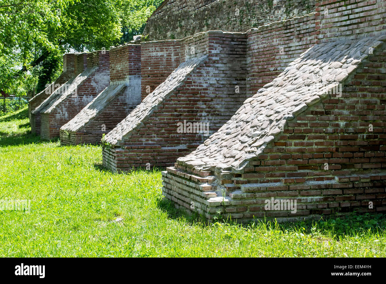 Medieval brick buttresses used to increase the strength of a citadels wall Stock Photo