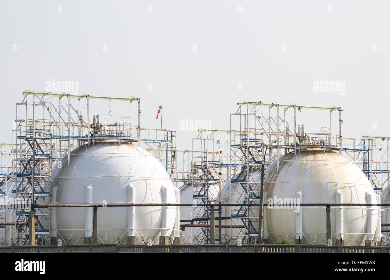 Fuel storage tanks on an oil and gas refinery area Stock Photo