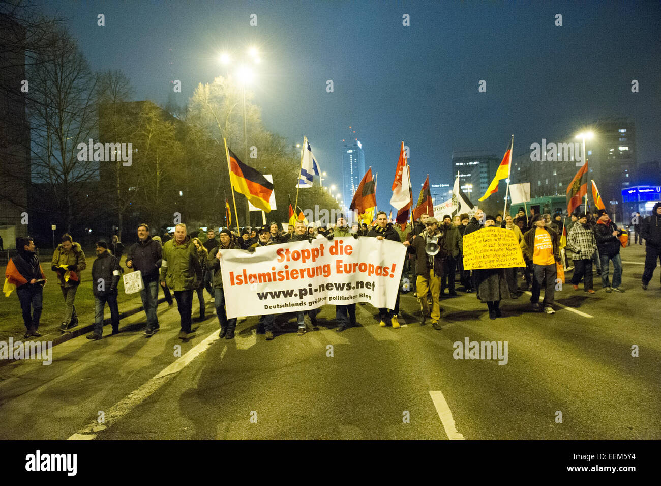 Berlin, Germany. 19th Jan, 2015. Supporters of the Islam-critical 'Baergida' (Berlin patriots against the Islamization of the West) movement demonstrate holding a placard inscribed 'Stoppt die Islamisierung Europas' (lit. 'Stop the Islamization of Europe') in Berlin, Germany, 19 January 2015. A terrorist threat by Islamists against the 'Pegida' (Patriotic Europeans against the Islamization of the West) movement has resulted in a prohibition by the police of all open-air gatherings in Dresden this Monday (19 January 2015). Photo: Paul Zinken/dpa/Alamy Live News Stock Photo