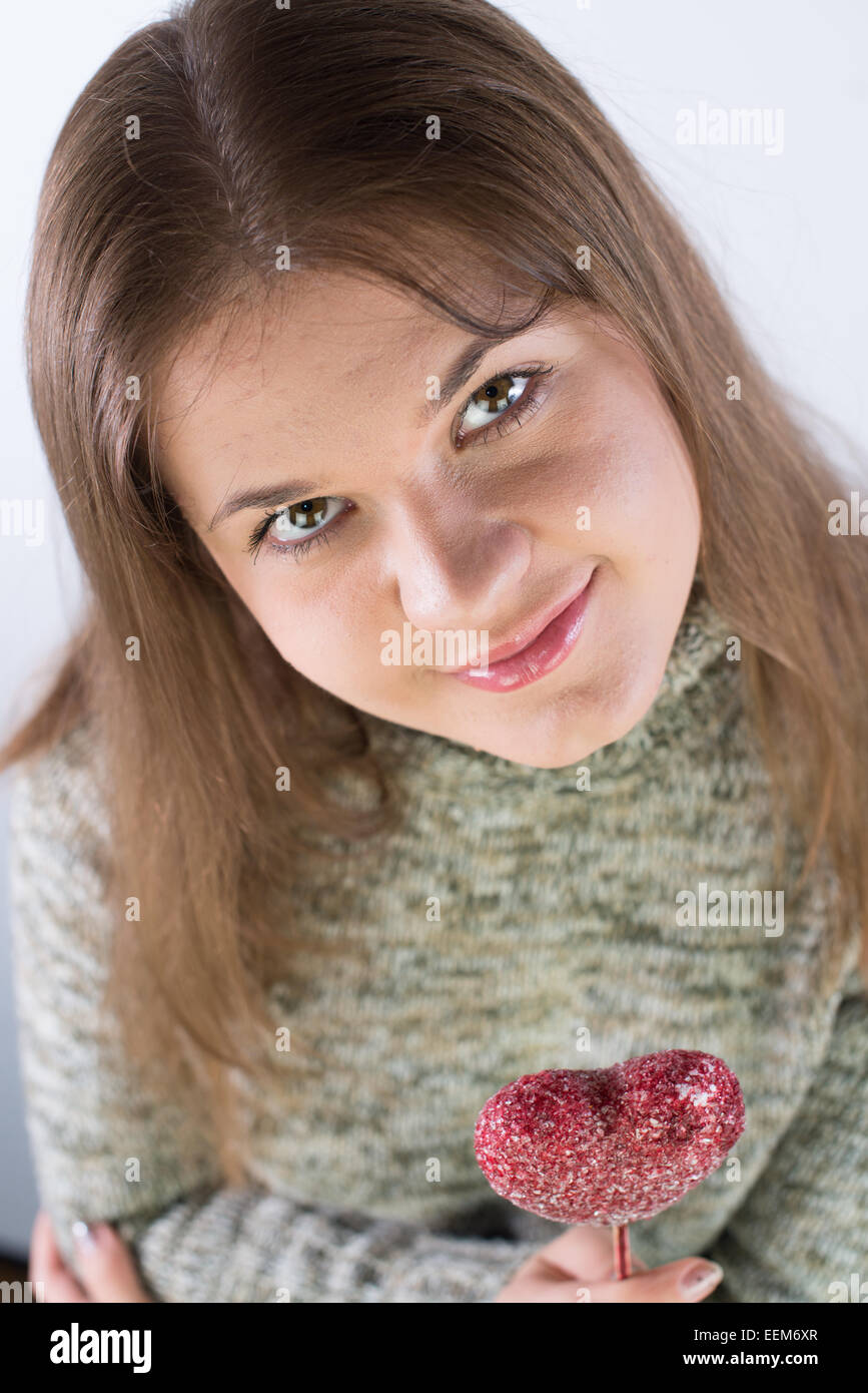 young woman with red valentines heart Stock Photo