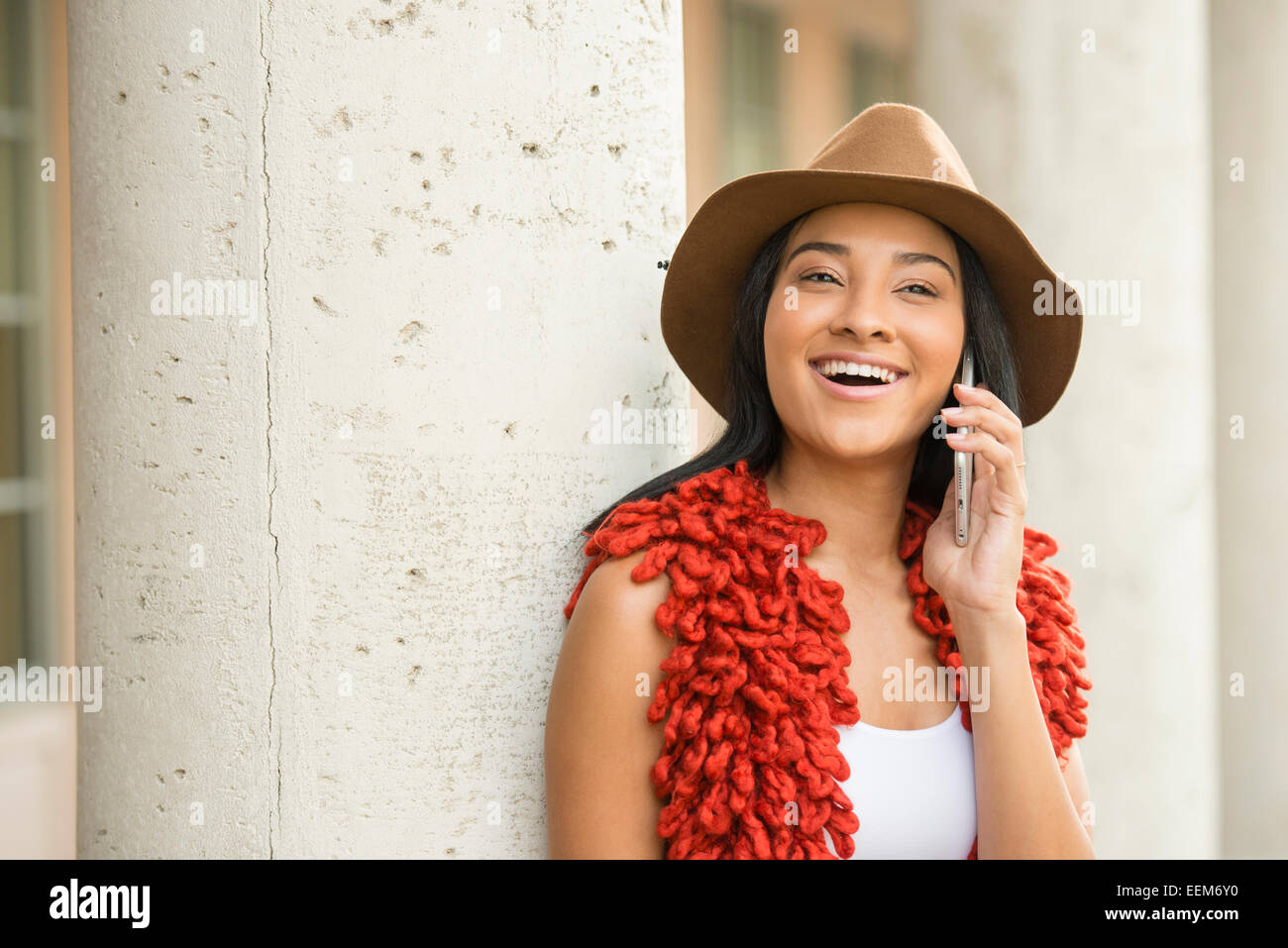 Black woman talking on cell phone outdoors Stock Photo