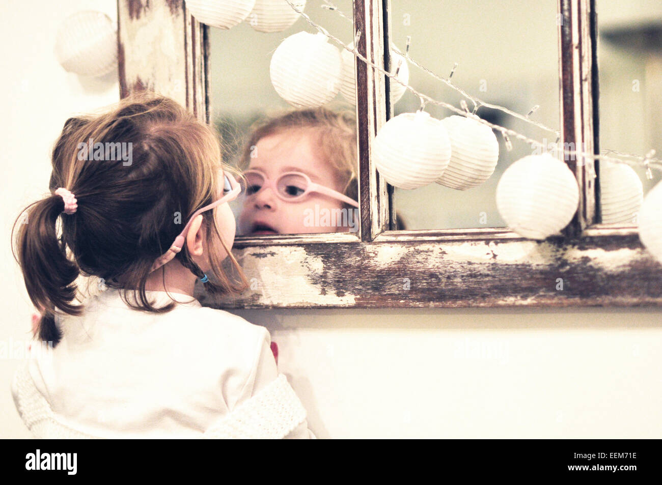 Girl in mirror hi-res stock photography and images - Alamy