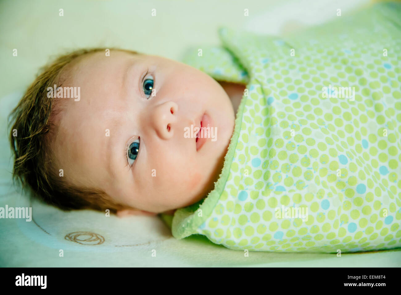 Baby swaddled blanket hires stock photography and images Alamy