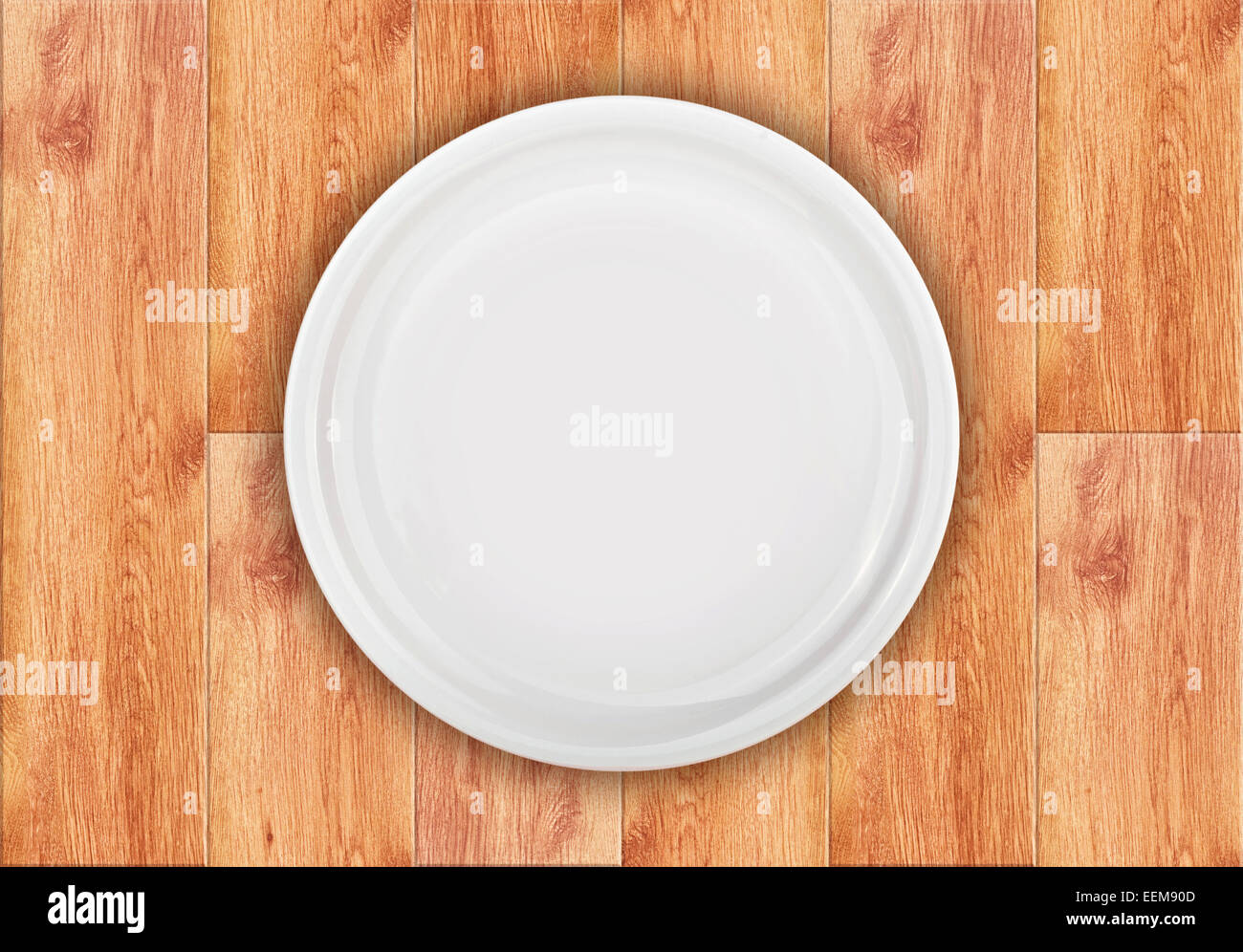 Empty Clean White Flat Plate on Wooden Table Background Stock Photo