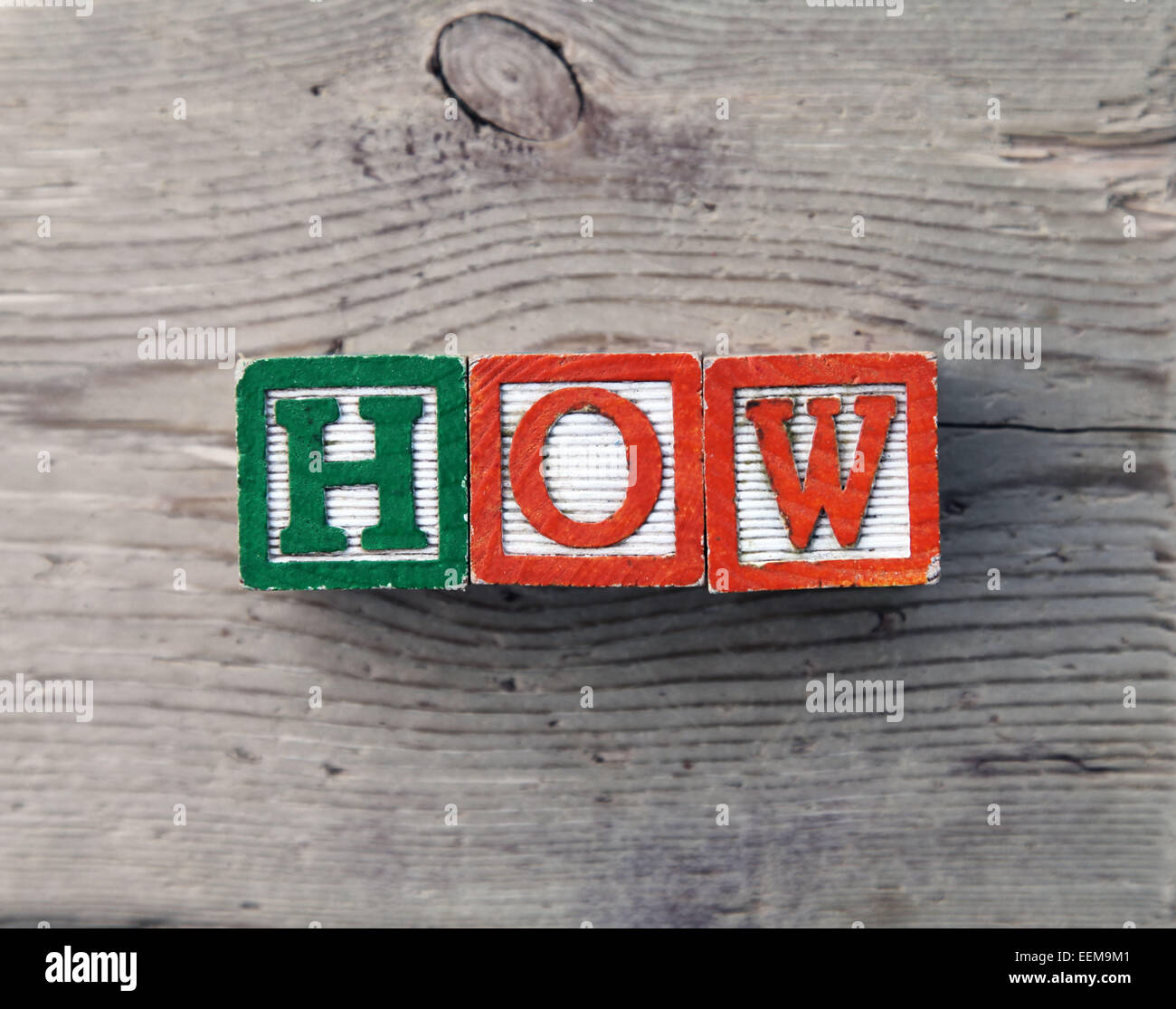 It's a photo top view of wood blocks or wood cubes combined together to create the word Stock Photo