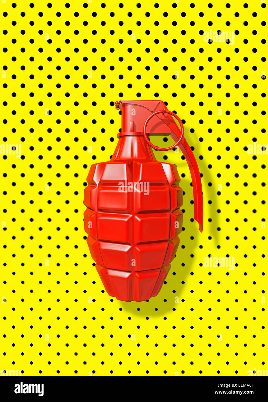 Close up of red grenade on polka dot background Stock Photo