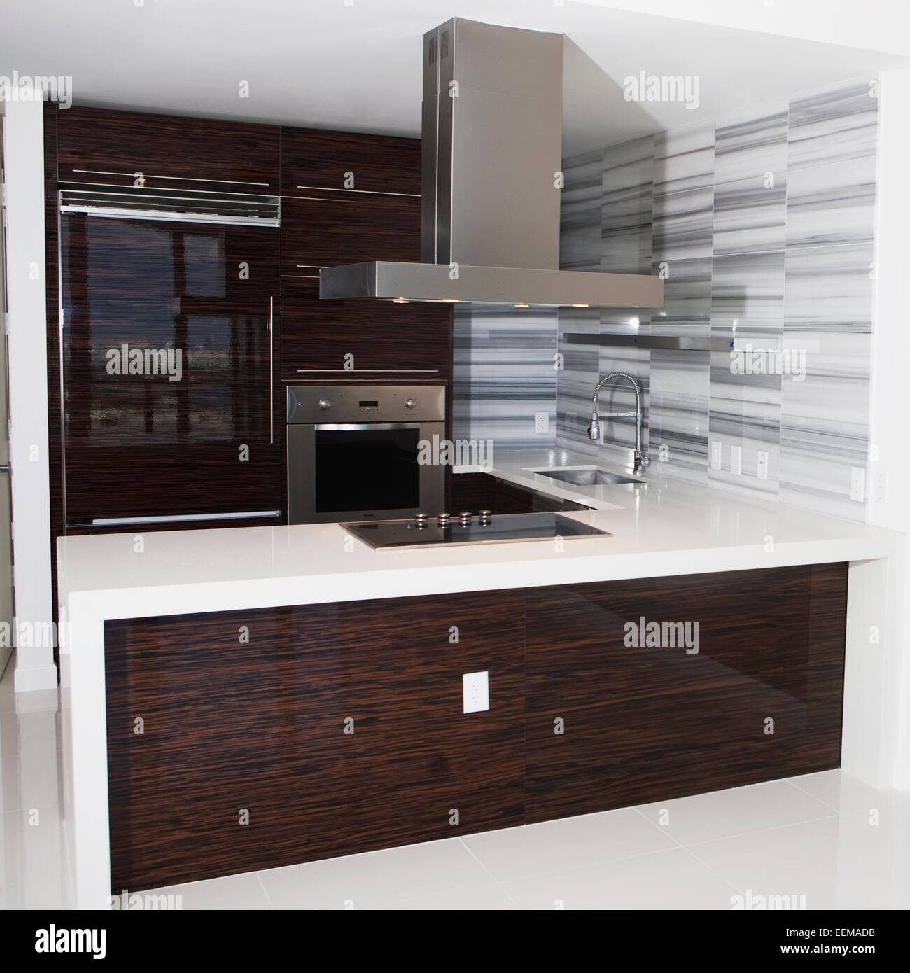 Vent, stove and countertop in empty modern kitchen Stock Photo Alamy