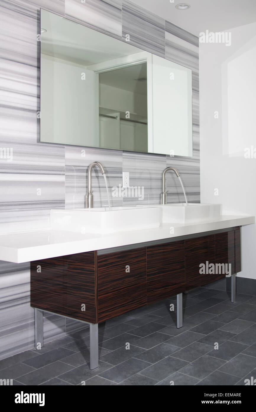 Sinks and mirror in modern bathroom Stock Photo Alamy