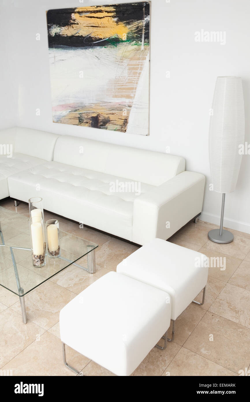 Ottomans, coffee table and sofa in modern living room Stock Photo Alamy