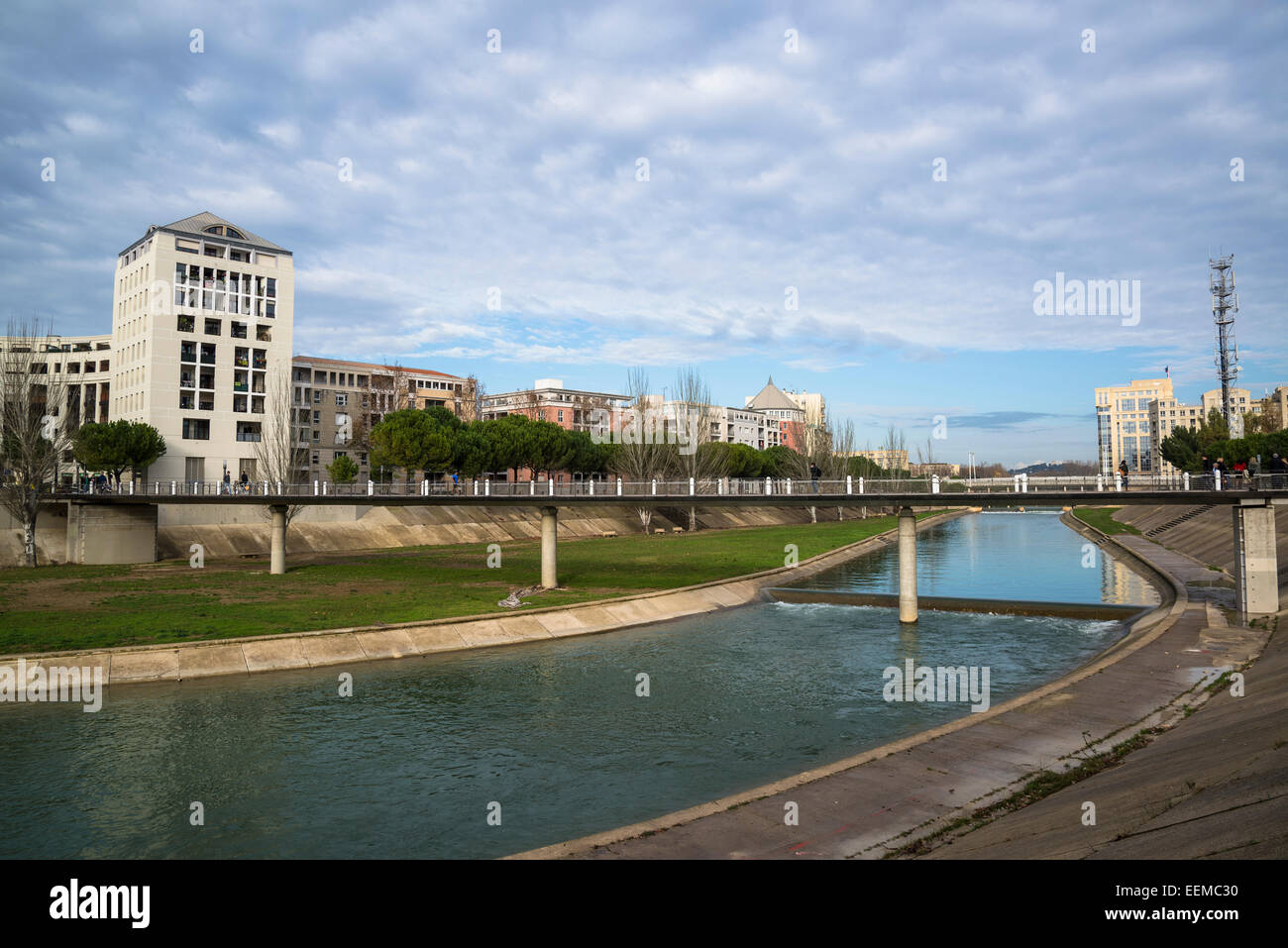 Bridge over river Lez and new urban development, Montpellier, France Stock Photo