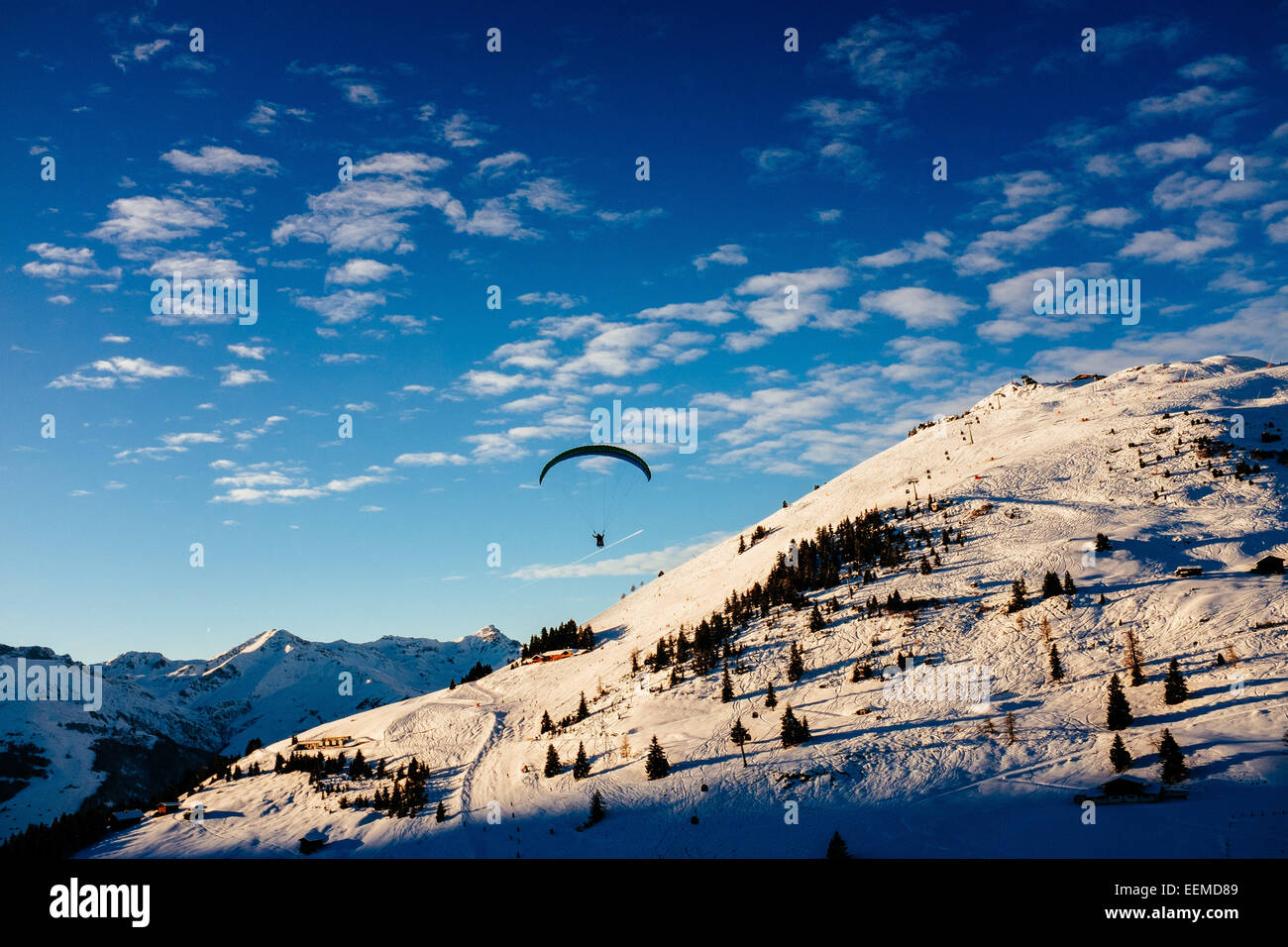Paraglider flying over Penken in Zillertal valley , Tirol,  Austria Stock Photo