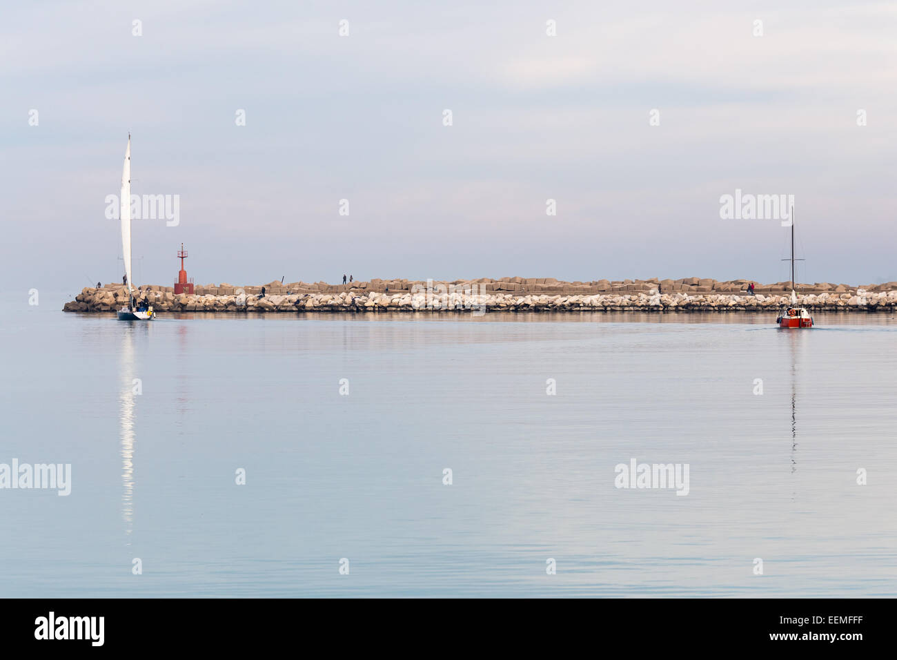 sailing boats leaving the port Stock Photo Alamy