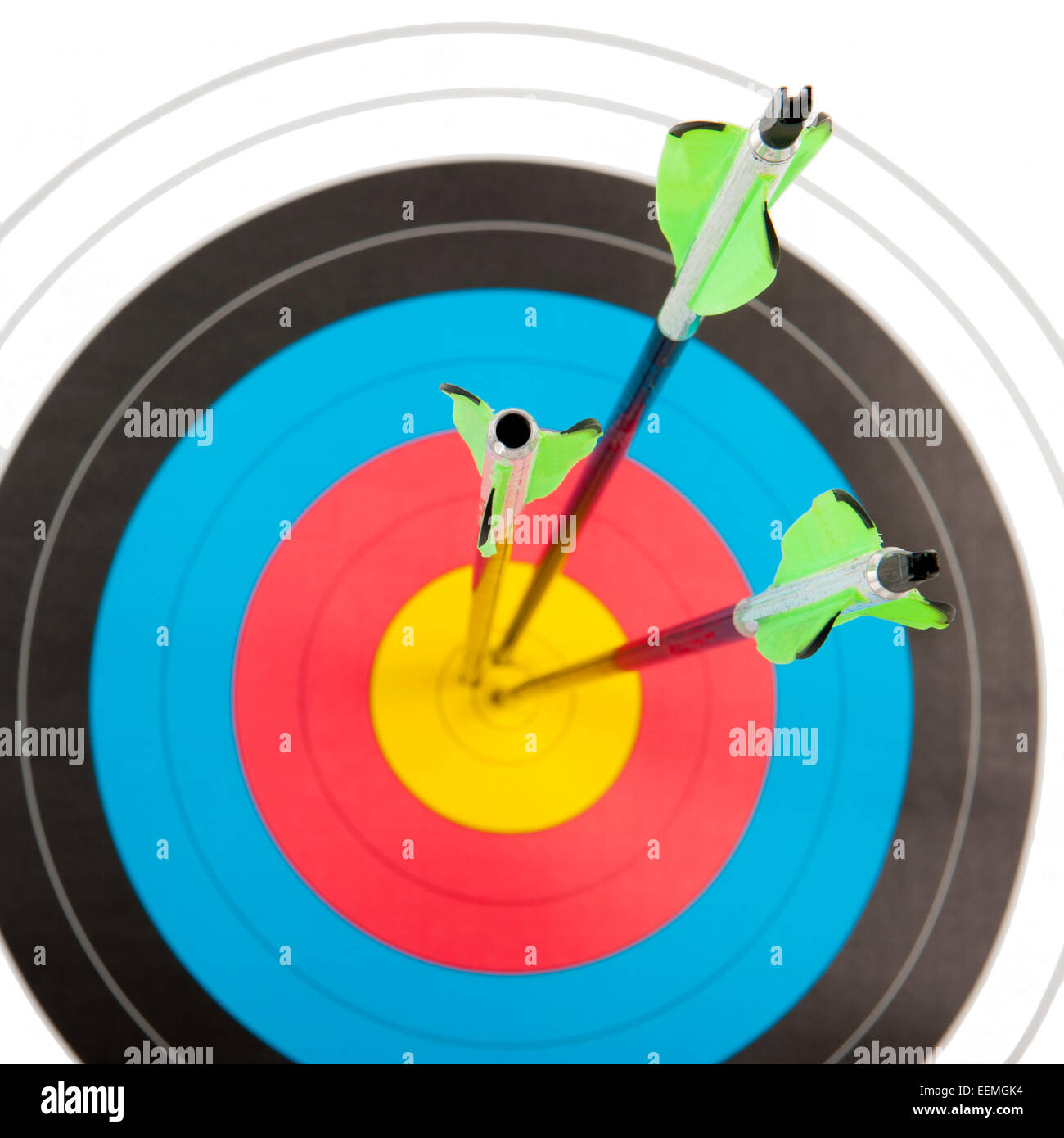 The bull's eye of an archery target hit by three arrows is a square frame Stock Photo Alamy