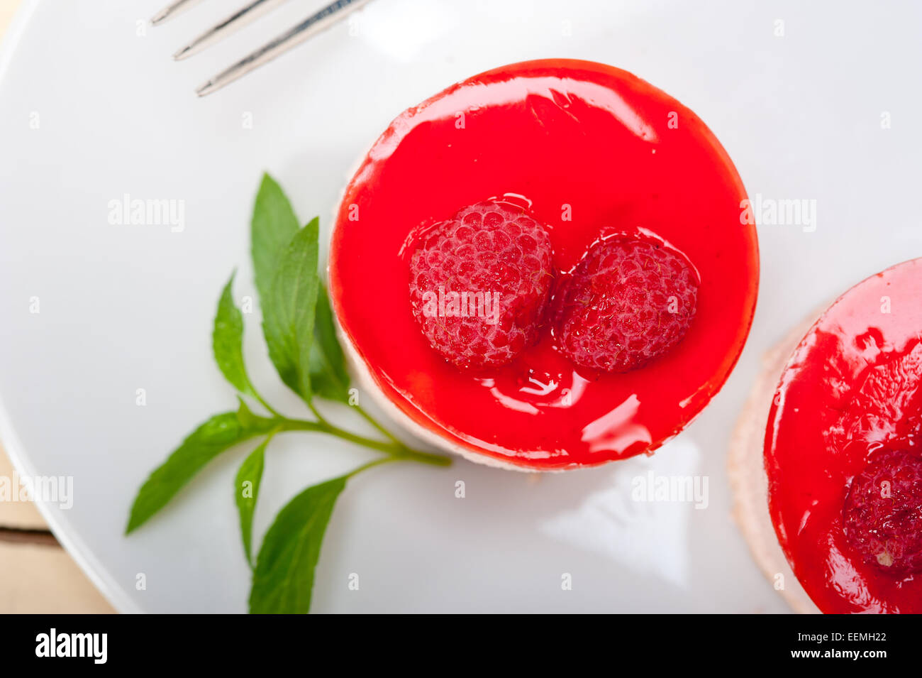 Round Raspberry Sweets fresh raspberry cake mousse dessert round shape with mint leaves Stock ...